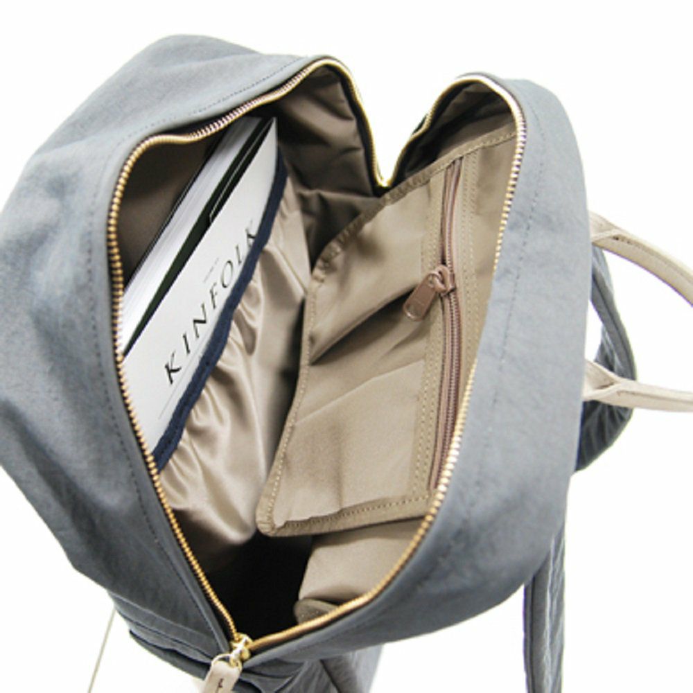 現仕様はコイル製ファスナーです